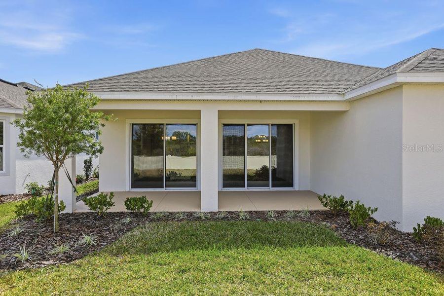 Exterior details and patio area of a home in Center Lake Ranch Community Group Page, St. Cloud (Image 18).