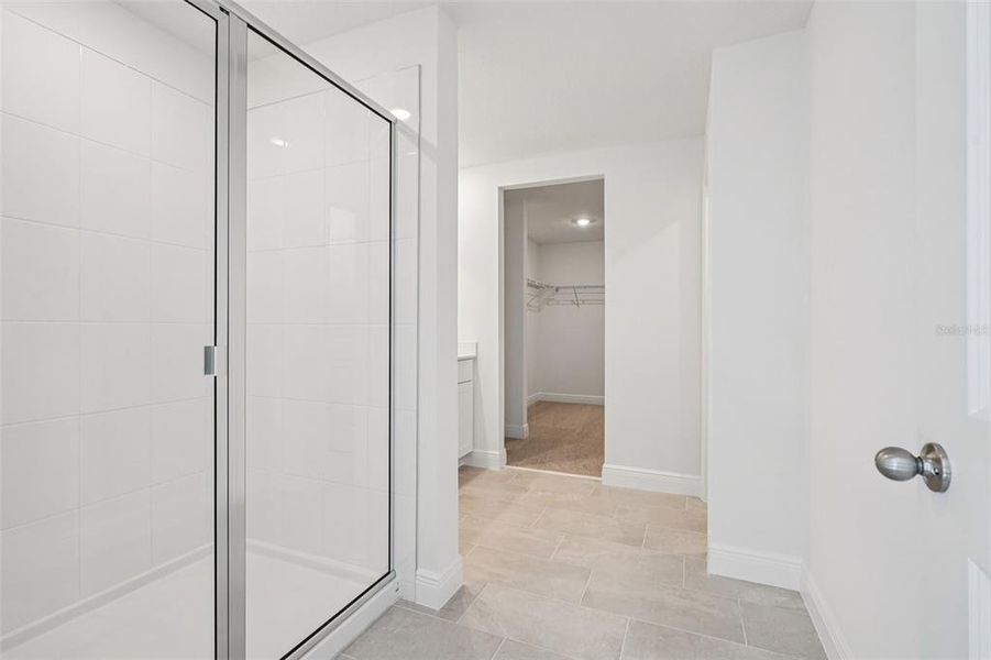 Spacious, unfurnished interior of a new home in The Reserve at Hammock Oaks - Signature Series, Lady Lake (Image 25).