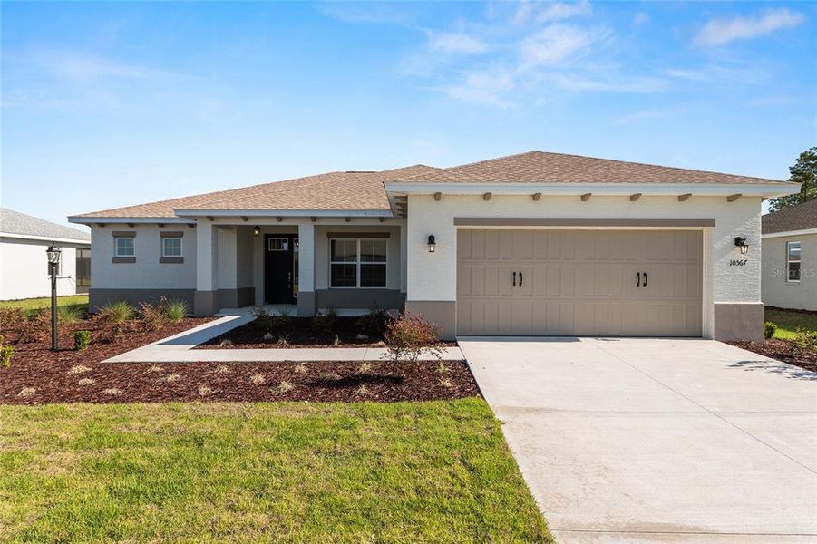 Front exterior of a new home in , Ocala, FL, highlighting curb appeal (Image 24).