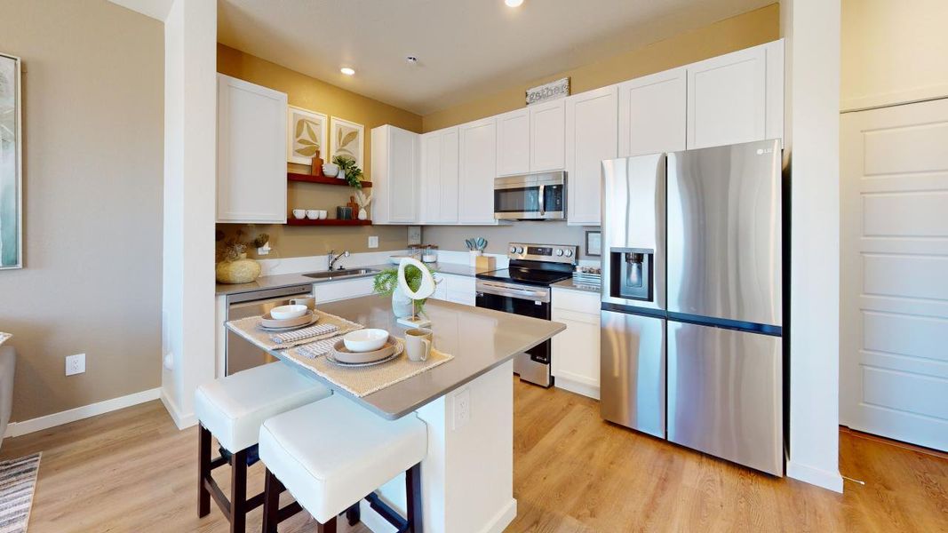 Representative furnished interior of a home built from the Westcliffe by Baessler Homes in Conestoga, Ault (Image 8).