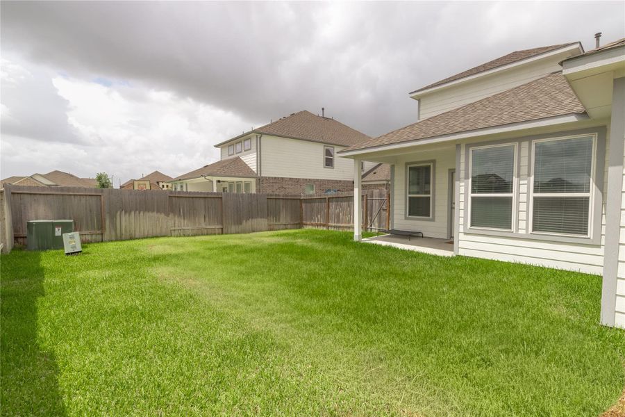 Exterior details and patio area of a home in Morton Creek Ranch, Katy (Image 20).