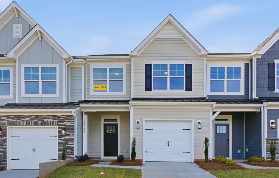 Front exterior of a new home in Blythe Mill Townhomes, Waxhaw, NC, highlighting curb appeal (Image 2). Front exterior of a new home in Blythe Mill Townhomes, Waxhaw, NC, highlighting curb appeal (Image 2).