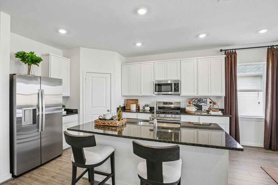 Representative furnished interior of a home built from the Charlton by Taylor Morrison in Mason Woods, Cypress (Image 14).