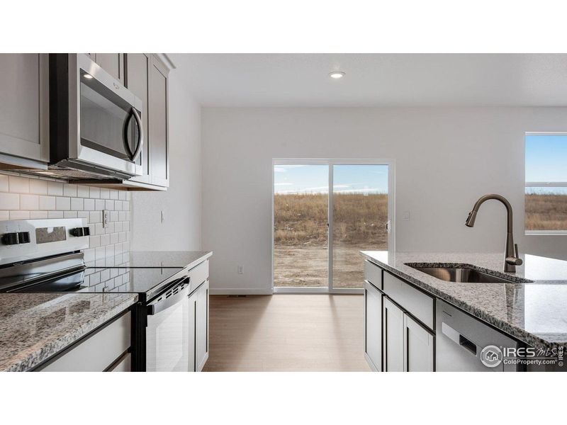Furnished interior view inside a new home in Vista Meadows, Fort Lupton (Image 4).