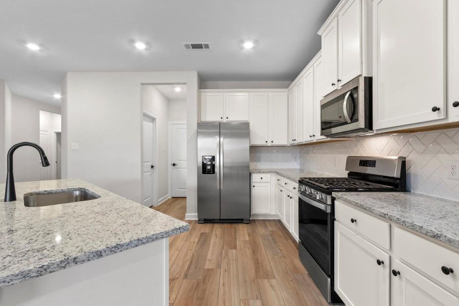 Furnished interior view inside a new home in Emberly, Beasley (Image 4).