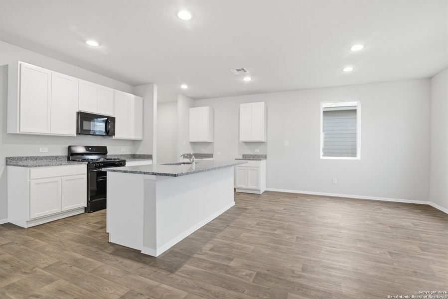 Furnished interior view inside a new home in Hunters Ranch, San Antonio (Image 5).
