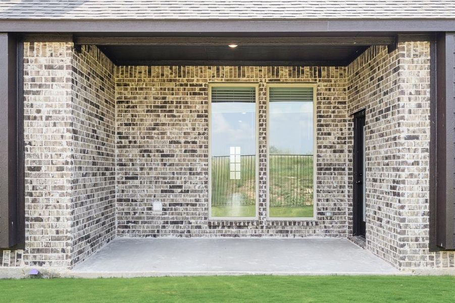 Exterior details and patio area of a home in Godley Ranch Classic, Godley (Image 3). Exterior details and patio area of a home in Godley Ranch Classic, Godley (Image 3).