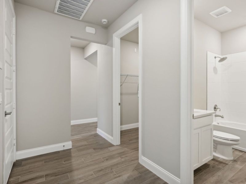 Hallway in the Emilia floorplan at 8993 Dahlia Circle