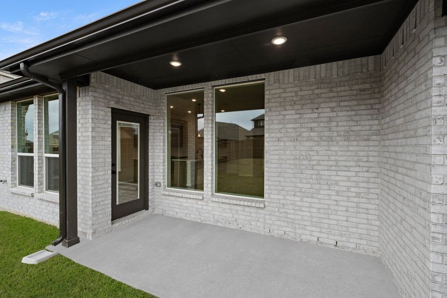 Exterior details and patio area of a home in Silo Mills - Select Series, Joshua (Image 20).