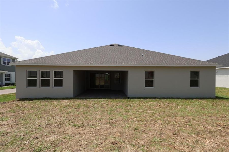 Exterior details and patio area of a home in Wolf Lake Ranch, Apopka (Image 4).