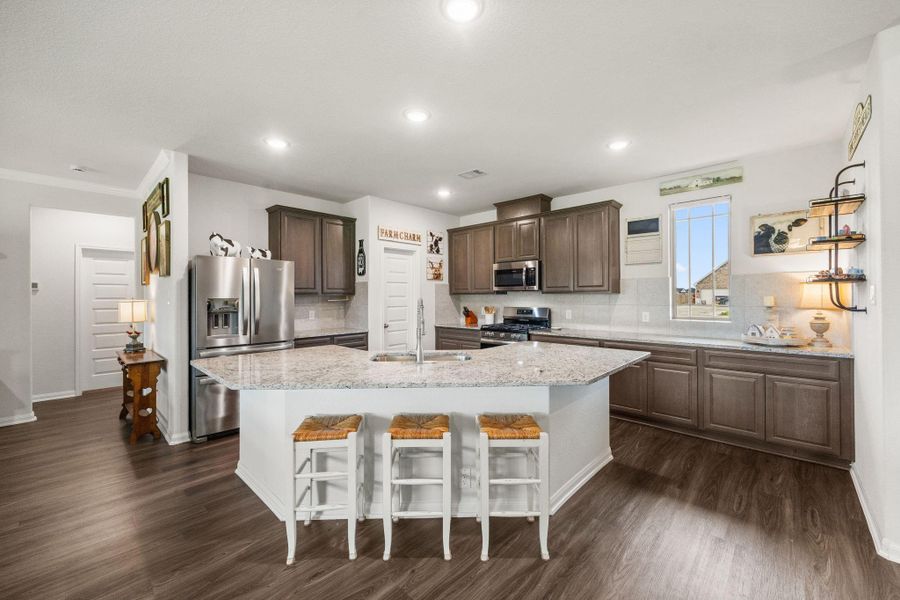 Tons of counter space for entertaining and meal prep! Walk-in pantry!