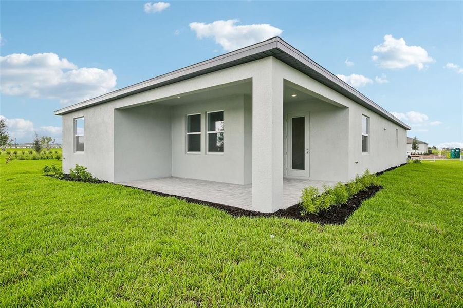 Exterior details and patio area of a home in Coasterra, Palmetto (Image 2). Exterior details and patio area of a home in Coasterra, Palmetto (Image 2).