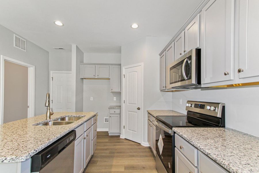 Representative furnished interior of a home built from the Nicklaus by RiverWILD Homes in Riverwood Ranch, Clayton (Image 7).