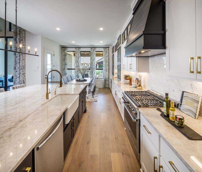 Representative furnished interior of a home built from the 222G by Highland Homes in Quail Hollow, Rockwall (Image 13).