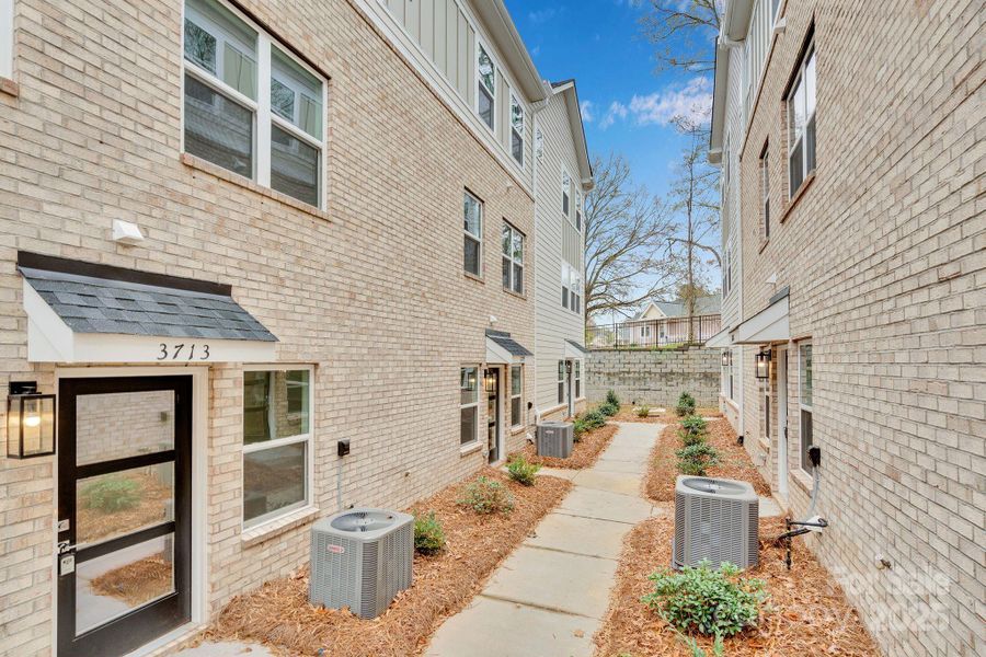 Exterior details and patio area of a home in , Charlotte (Image 1).
