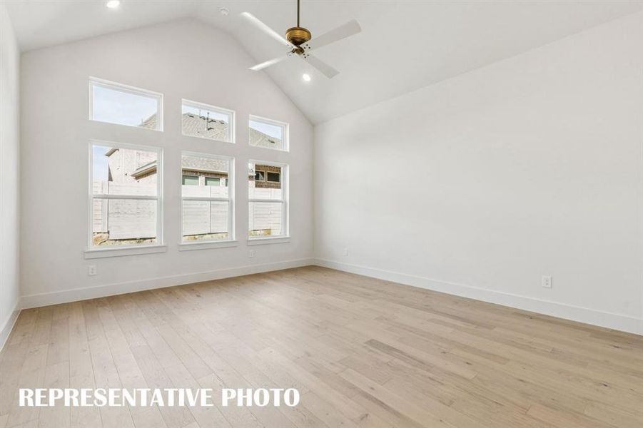 The beautiful color palette continues into your dreamy owner's suite which is located at the rear of the home for additional privacy.  REPRESENTATIVE PHOTO