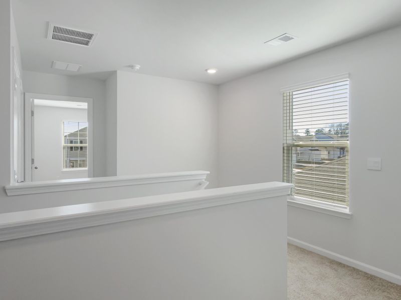 Spacious, unfurnished interior of a new home in Pine Hills at Cane Bay, Summerville (Image 20). Spacious, unfurnished interior of a new home in Pine Hills at Cane Bay, Summerville (Image 20).