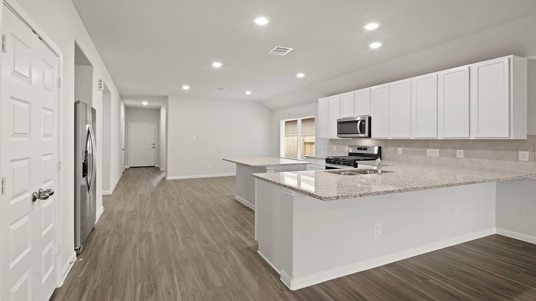 Family Room to Kitchen and Dining Area