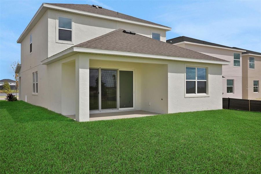 Exterior details and patio area of a home in Turnleaf, Punta Gorda (Image 2).