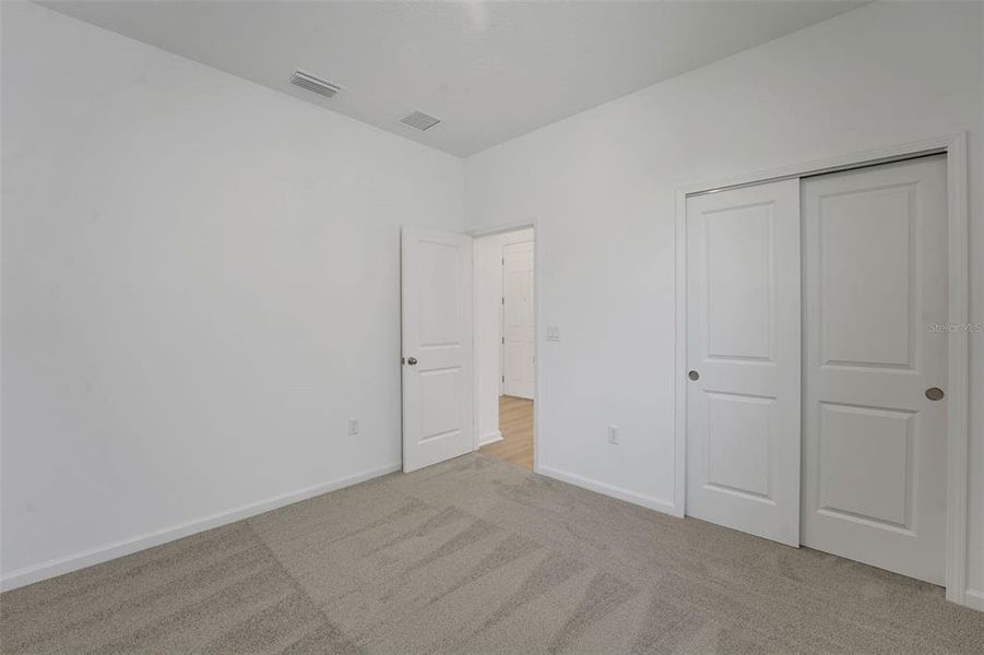 Spacious, unfurnished interior of a new home in Willowbrook North, Winter Haven (Image 29).