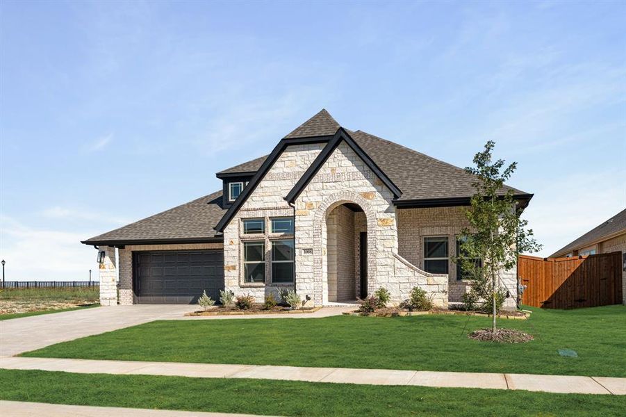 Front exterior of a new home in Timberbrook 3B-4A, Justin, TX, highlighting curb appeal (Image 17).