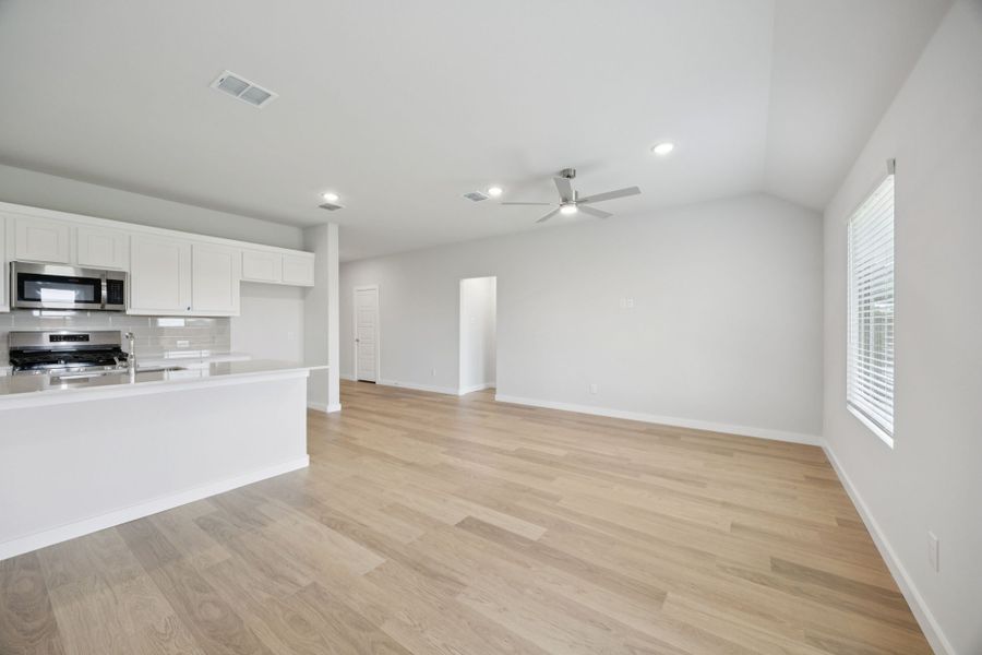 Living Room in the Hadley home plan by Trophy Signature Homes – REPRESENTATIVE PHOTO Living Room in the Hadley home plan by Trophy Signature Homes – REPRESENTATIVE PHOTO