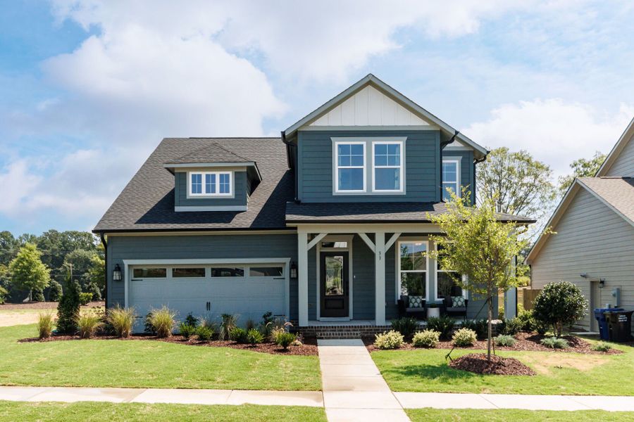 Front exterior of a home in the Serenity - The Village Collection community, located in Fuquay Varina, NC (Image 24).