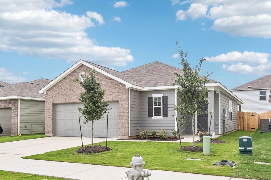Representative exterior photo of a completed home built from the Glimmer by Starlight Homes in Cordova Trails, Seguin, TX (Image 18).