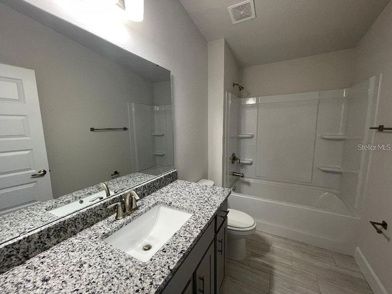 Furnished interior view inside a new home in Highland Hills, Hudson (Image 5).