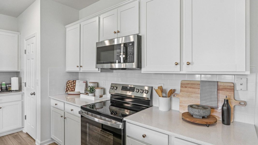 Merritt Floorplan Kitchen by DRB Homes in the Panther Creek Community, Jacksonville, FL