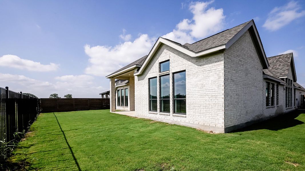 Exterior details and patio area of a home in Juniper Springs, Lockhart (Image 24).