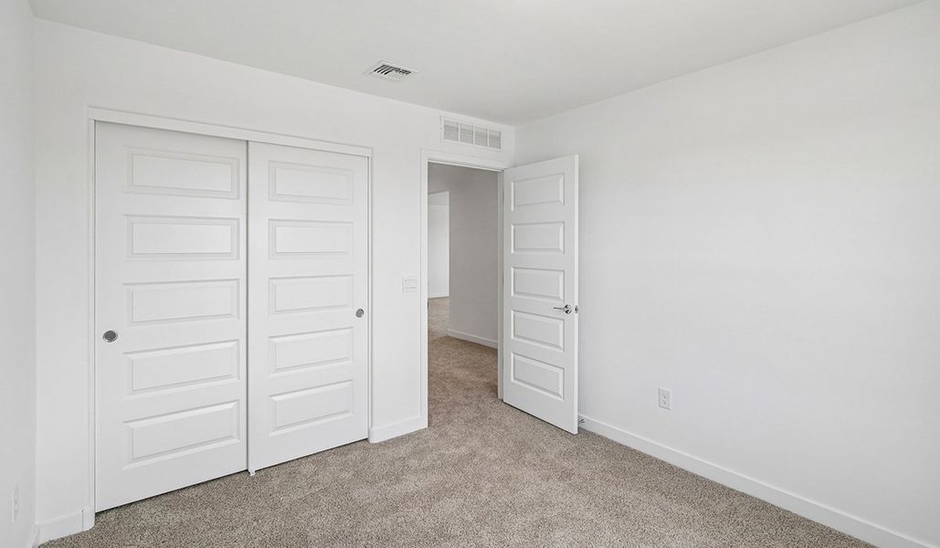 Spacious, unfurnished interior of a new home in The Oasis at Rocking K, Vail (Image 28).