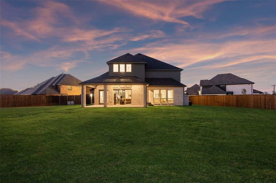 Exterior details and patio area of a home in Cambridge Estates, Prosper (Image 3). Exterior details and patio area of a home in Cambridge Estates, Prosper (Image 3).