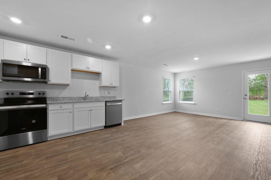 Furnished interior view inside a new home in Center Pointe, Santee (Image 9).