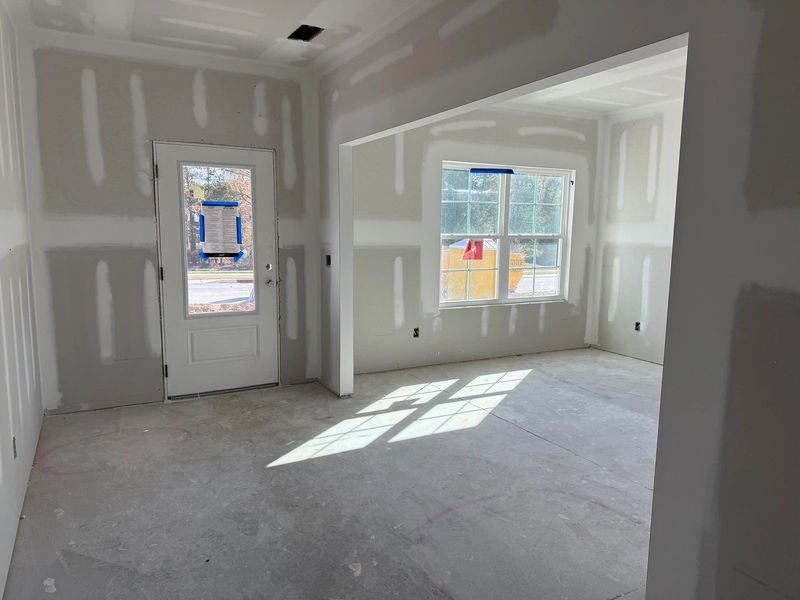 Foyer featuring the AW Collection® Serene - Soft light and open space create a calm welcome.