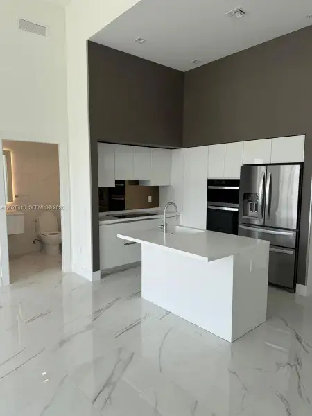 Furnished interior view inside a new home in , Hallandale Beach (Image 4). Furnished interior view inside a new home in , Hallandale Beach (Image 4).