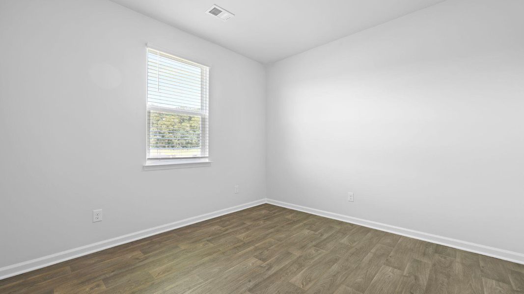 Spacious, unfurnished interior of a new home in The Ranch, Holly Hill (Image 22).