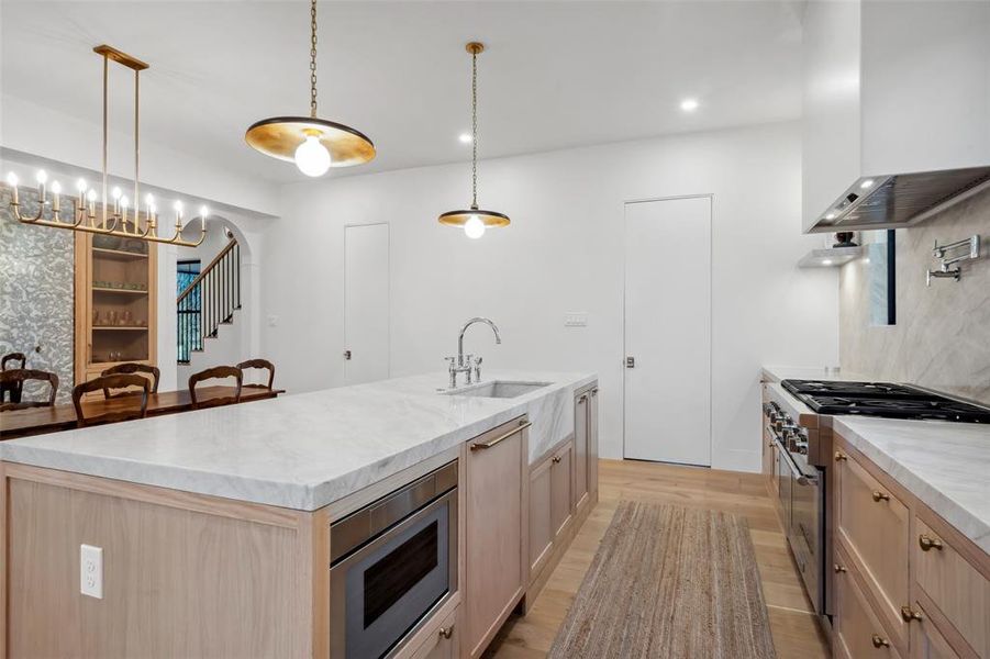 Kitchen island - note the Thermador microwave, the Thermador dishwasher with cabinet matching front is next to microwave