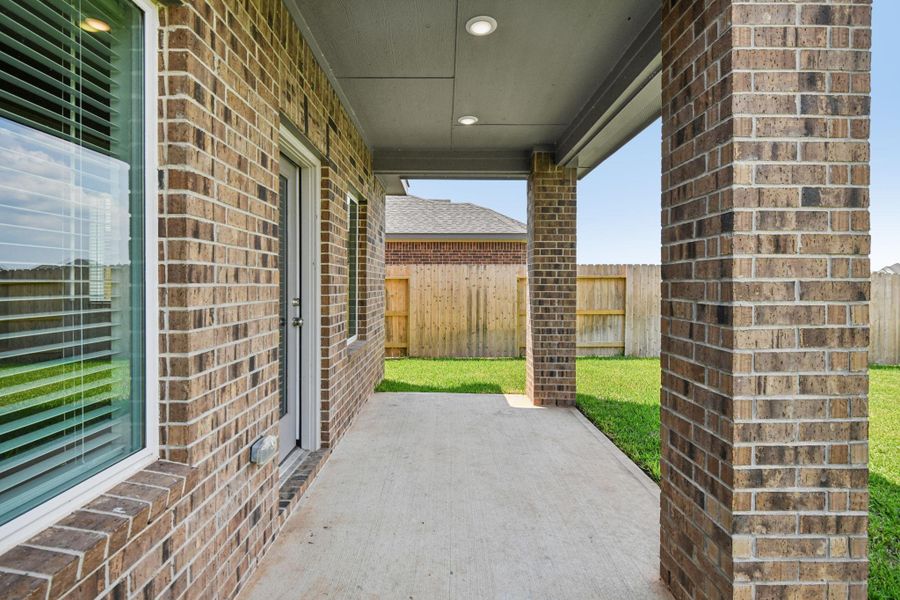 Exterior details and patio area of a home in Stewart's Ranch, Conroe (Image 1). Exterior details and patio area of a home in Stewart's Ranch, Conroe (Image 1).
