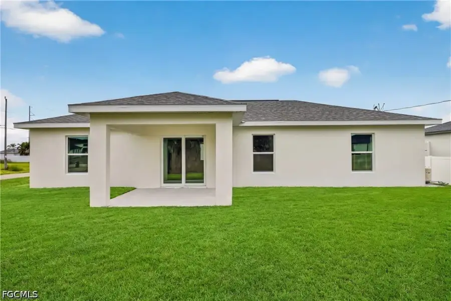 Exterior details and patio area of a home in Cape Coral, Cape Coral (Image 3).