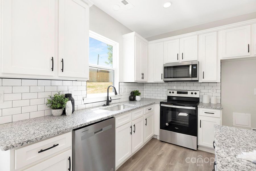 Furnished interior view inside a new home in , Dallas (Image 10). Furnished interior view inside a new home in , Dallas (Image 10).