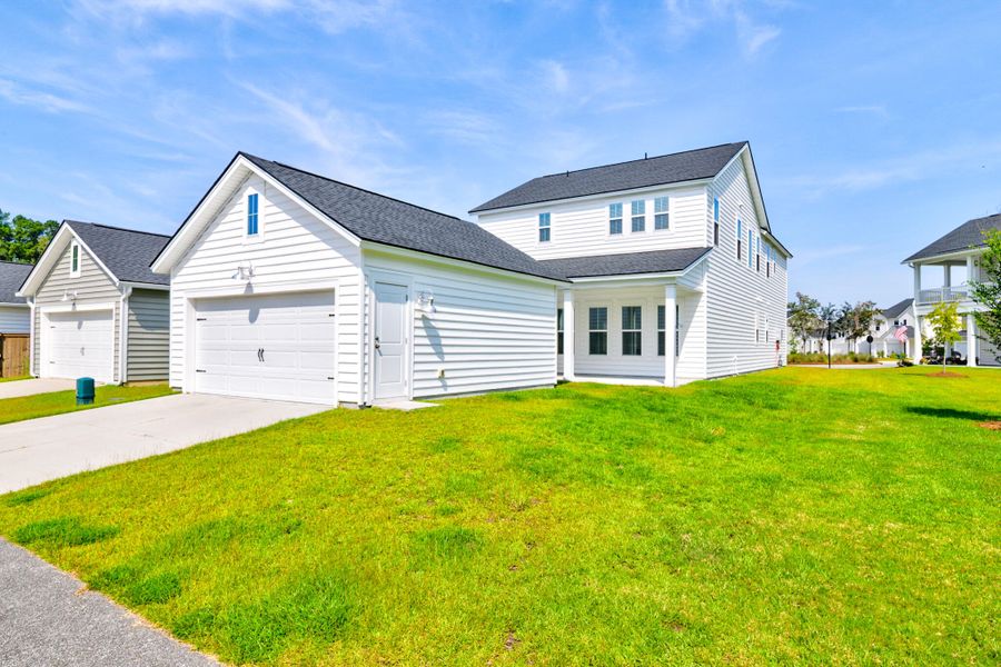 Front exterior of a new home in , Summerville, SC, highlighting curb appeal (Image 26).