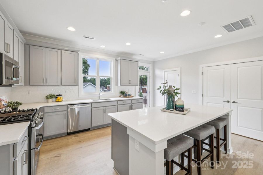 Furnished interior view inside a new home in Walk23, Huntersville (Image 3).