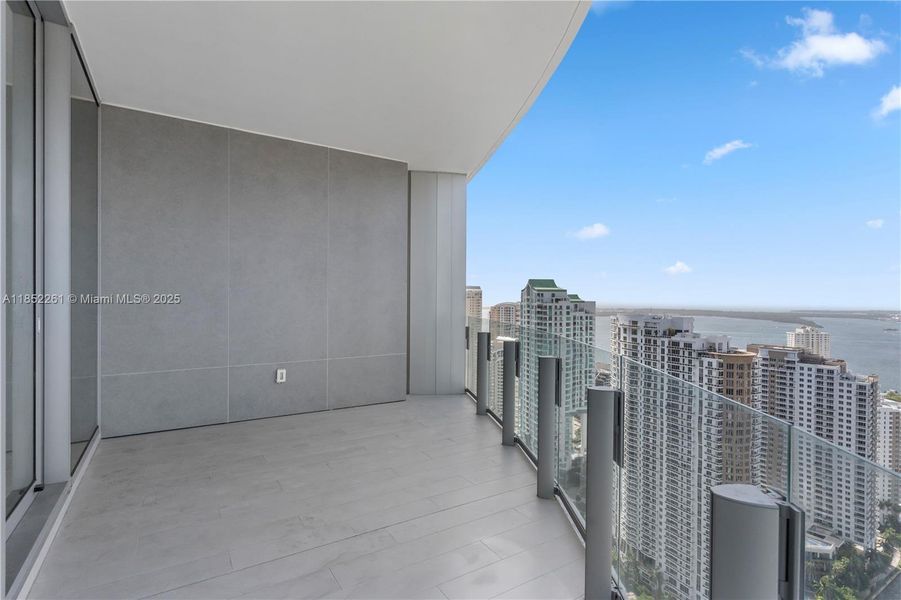 Exterior details and patio area of a home in Aston Martin Residences, Miami (Image 21).