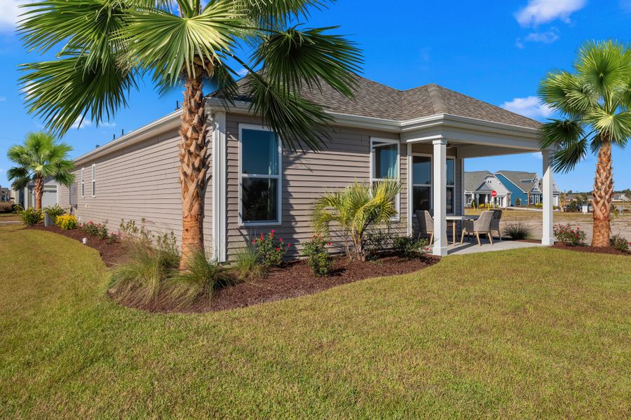 Exterior details and patio area of a home in Traditions at Carolina Forest, Myrtle Beach (Image 2). Exterior details and patio area of a home in Traditions at Carolina Forest, Myrtle Beach (Image 2).
