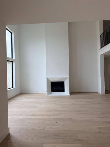 Large windows and high ceilings in the family room. Representative image. Large windows and high ceilings in the family room. Representative image.