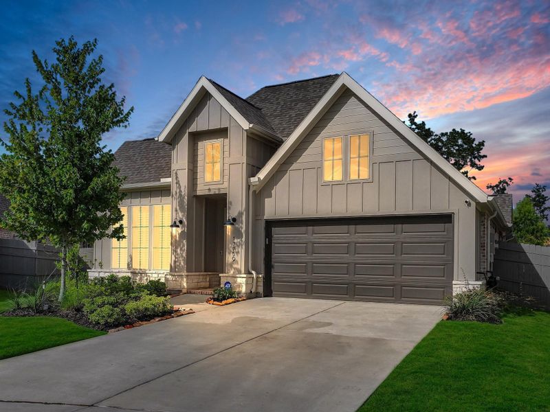 Front exterior of a new home in Artavia, Conroe, TX, highlighting curb appeal (Image 29).