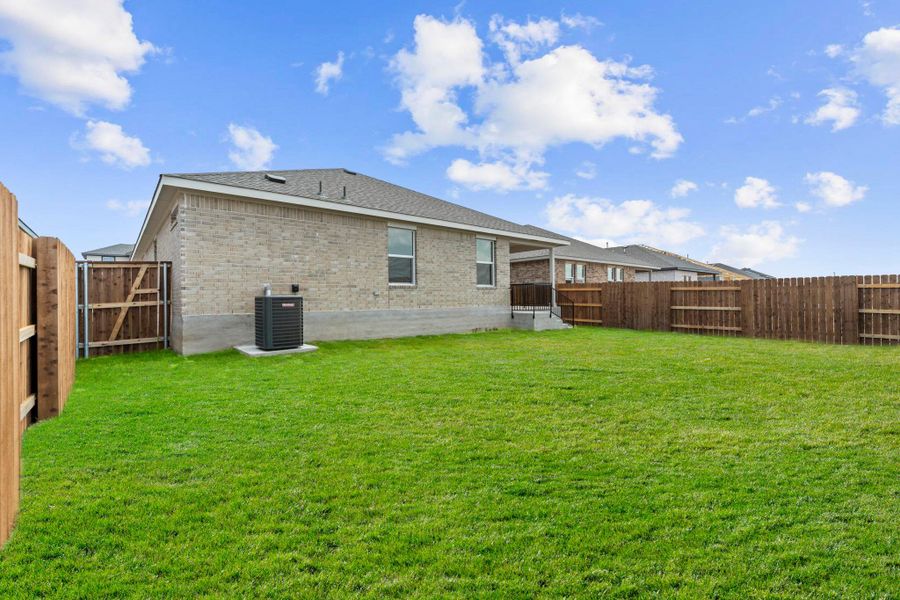 Exterior details and patio area of a home in Bar W Ranch, Leander (Image 1). Exterior details and patio area of a home in Bar W Ranch, Leander (Image 1).