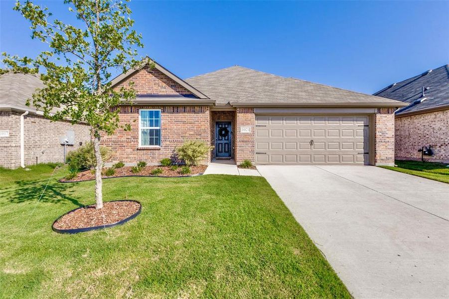 Front exterior of a new home in Walden Pond, Forney, TX, highlighting curb appeal (Image 1). Front exterior of a new home in Walden Pond, Forney, TX, highlighting curb appeal (Image 1).