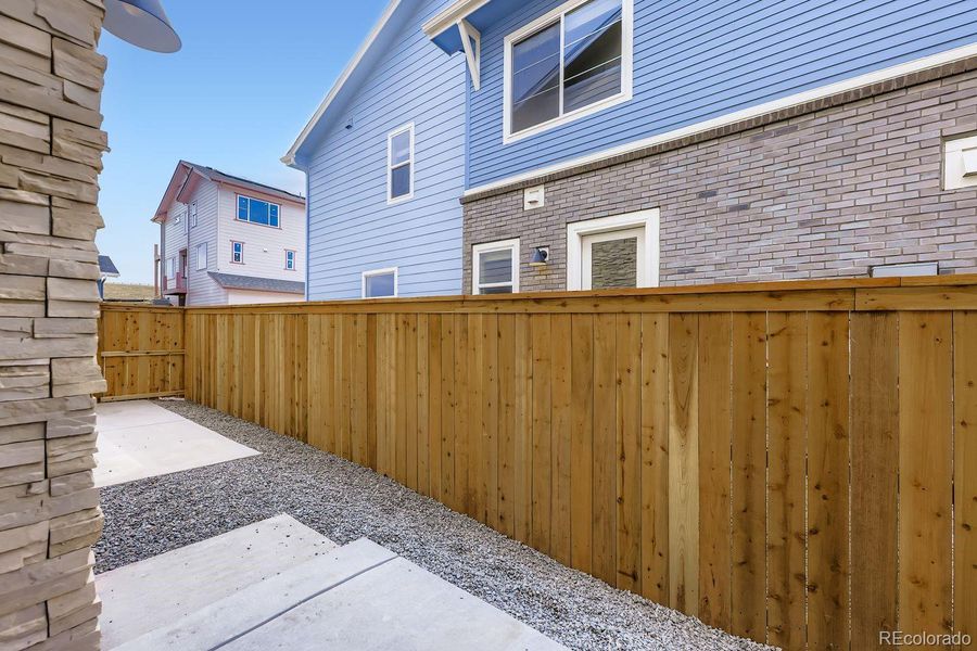 Exterior details and patio area of a home in Uplands, Westminster (Image 22).
